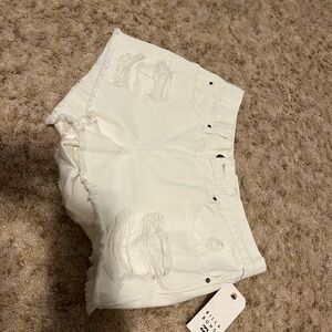 billabong new with tags white shorts size 27, distressed